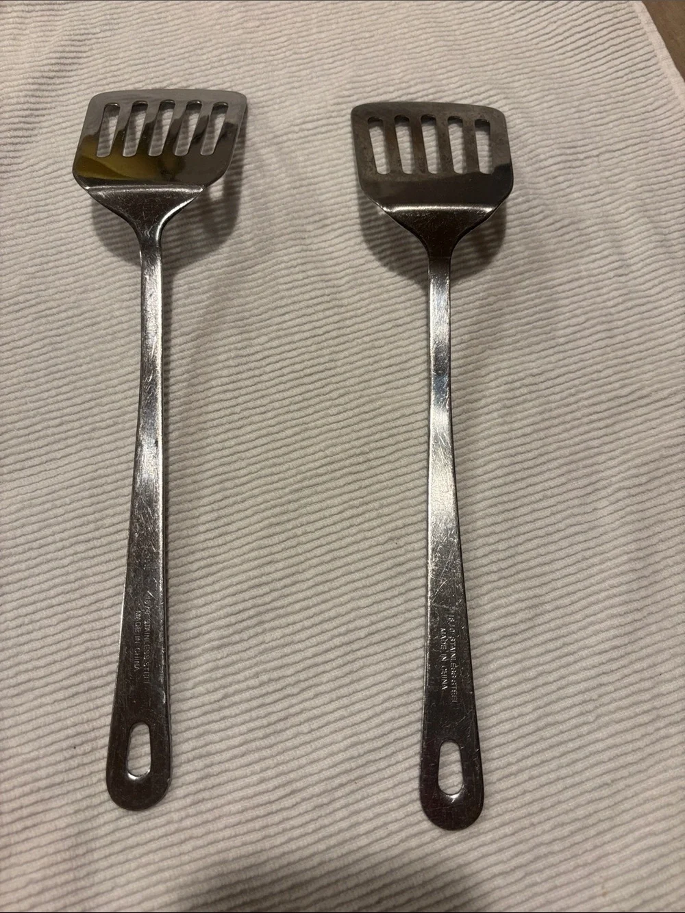 Source Unknown pair stainless